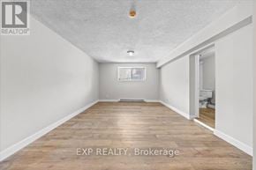 Ottawa condo for rent - A room with EXP Realty Brokerage written on the floor.
