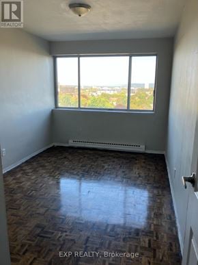 Ottawa condo for rent - A room with a window and a tiled floor.