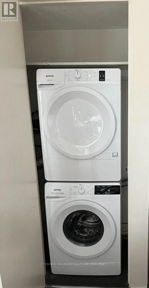 Toronto (South Riverdale) apartment for rent - A white GE dryer is on top of a white GE washer.