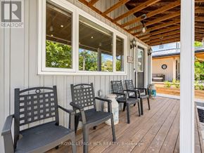 King (Schomberg) apartment for rent - A wooden porch with chairs and a table.