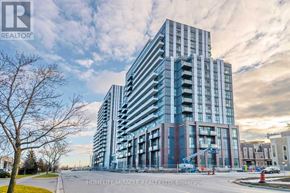 Vaughan (Vaughan Corporate Centre) condo for rent - A modern multi-story building with a glass facade is under construction.