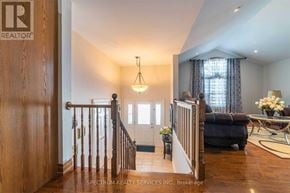 Niagara Falls (Ascot) apartment for rent - A living room with a couch, chairs, and a coffee table.