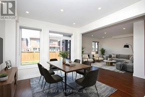 East Gwillimbury (Holland Landing) apartment for rent - A modern dining room with a wooden table and chairs.