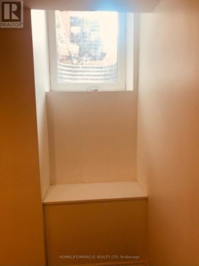 Mississauga (Central Erin Mills) apartment for rent - A window in a room with a view of a street.