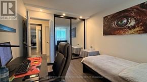 Mississauga (Lakeview) condo for rent - A bedroom with a bed, desk, and chair is shown.