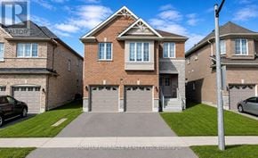 Whitby (Williamsburg) apartment for rent - A large brick house with a driveway in front.