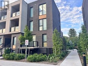 Toronto (Birchcliffe-Cliffside) townhouse for rent - A building with a no parking sign in front of it.