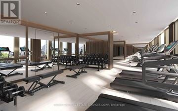 Toronto (Annex) condo for rent - A gym with treadmills, weights and exercise equipment.