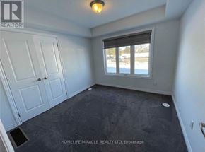 Brampton (Heart Lake West) townhouse for rent - A room with a window and a door is for rent.