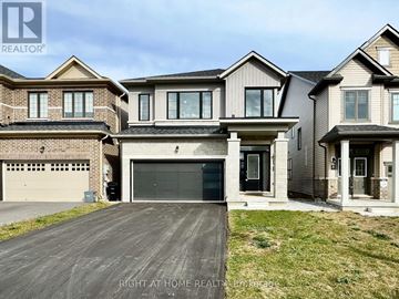Barrie apartment for rent - A large, modern house with a garage is for sale.