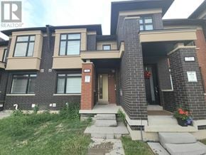 Brampton (Northwest Brampton) townhouse for rent - A modern brick house with a large front porch.