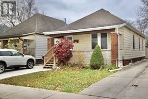 London East (East G) apartment for rent - A house with a red tree in front of it.