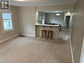 Collingwood apartment for rent - A room with a bar stool and a counter in it.