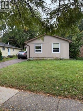 Waterloo apartment for rent - A house with a car parked in front.
