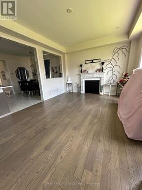 Brantford apartment for rent - A living room with a fireplace and a piano.