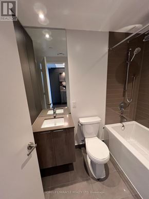 Mississauga (City Centre) condo for rent - A bathroom with a toilet, sink, and bathtub.