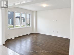 Welland (Dain City) apartment for rent - A room with wooden floors and white walls, ready for furnishing.