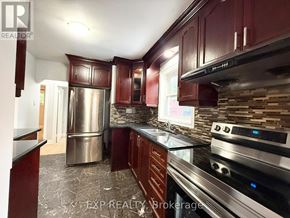 Toronto (Bendale) apartment for rent - A kitchen with dark wood cabinets and stainless steel appliances.
