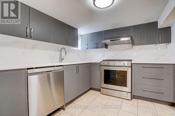 Toronto (Broadview North) apartment for rent - A kitchen with a stainless steel dishwasher and oven.