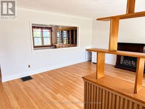Milton (Mn Milton North) apartment for rent - A room with a fireplace and a window.