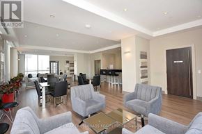 Mississauga (City Centre) condo for rent - A living room with grey couches and a glass coffee table.