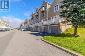 Ottawa condo for rent - A street view of a residential area with houses on both sides.