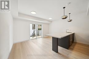 Toronto (Casa Loma) multi-family for rent - A room with a desk and a window.