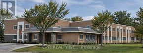 Fort Erie (Central) condo for rent - A building with the text "CPPI Realty Inc., Brokerage" in front of it.