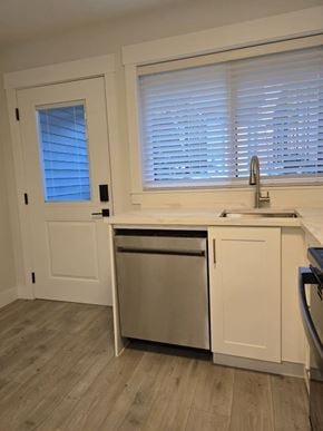 Mission apartment for rent - A kitchen with a dishwasher and a sink.