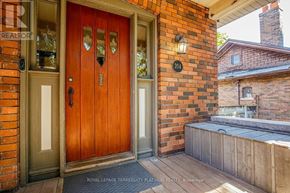Toronto (Willowdale West) apartment for rent - A red door with a glass window is on the left side of the image.