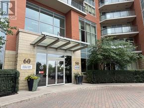 Markham (Unionville) condo for rent - The entrance to a building with the number 60 on it.