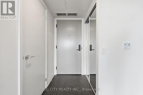 Toronto (Thorncliffe Park) condo for rent - A hallway with a door on the left and another door on the right.