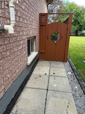 Toronto (West Hill) apartment for rent - A wooden gate with a diamond pattern in the middle is closed.