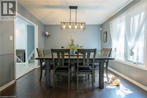 London apartment for rent - A dining room with a wooden table and chairs.