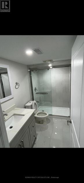 Brampton (Bram West) apartment for rent - A bathroom with a toilet, sink, and shower.