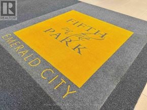 Toronto (Henry Farm) condo for rent - Fifth Park Emerald City logo on a grey carpet.
