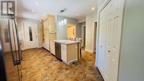 Saugeen Shores apartment for rent - A kitchen with wooden flooring and white walls.
