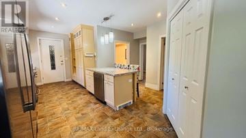 Saugeen Shores apartment for rent - A kitchen with wooden flooring and white walls.
