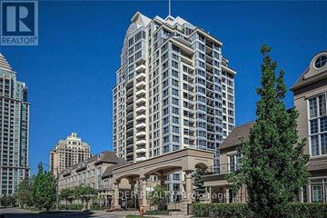 Toronto (Bayview Village) condo for rent - A tall building with a balcony in front of it.
