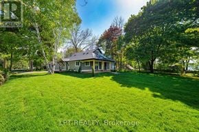 Georgina (Historic Lakeshore Communities) apartment for rent - A house with a lawn in front of it.