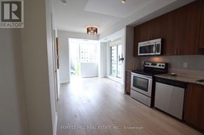 Toronto (Mount Pleasant West) condo for rent - A kitchen with a microwave, oven, and dishwasher.