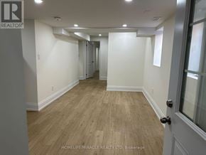 Brampton (Fletcher's West) apartment for rent - A hallway with wooden floors and white walls.