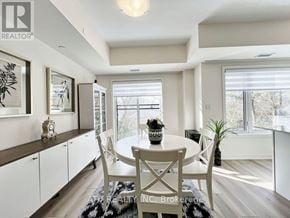 Richmond Hill (Mill Pond) townhouse for rent - A dining room with a table set for four.