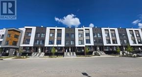 St. Catharines (E. Chester) townhouse for rent - A building with the text "Royal LePage NRC REALTY Brokerage" on the bottom.