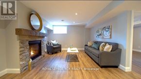 Southgate apartment for rent - A living room with a fireplace and a couch.