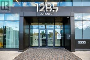 Toronto (Dovercourt-Wallace Emerson-Junction) condo for rent - The front of a building with the number 1285 and the words Dupont St on it.