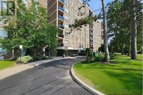 Toronto (Humber Summit) condo for rent - A residential building with a sign that reads "2833 North Gate".