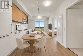 Toronto (Dovercourt-Wallace Emerson-Junction) condo for rent - A modern kitchen with a dining table and chairs.