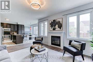 Woodstock (Woodstock - North) apartment for rent - A living room with a fireplace and a painting on the wall.