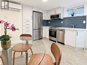 Toronto (High Park North) apartment for rent - A kitchen with a table and chairs.